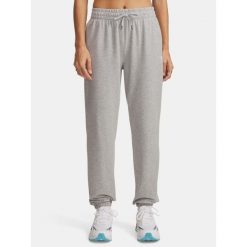 Spodnie damskie Under Armour Sport Terry Jogger. Szare spodnie sportowe Under Armour, bez wzorów, na fitness i siłownię. Za 159.99 zł.