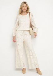 Beżowe Spodnie Ażurowe o Szerokim Kroju z Wysokim Stanem Yasedia. Brązowe jeansy Born2be, w ażurowe wzory, z jeansu, eleganckie, z podwyższonym stanem. Za 149.99 zł.
