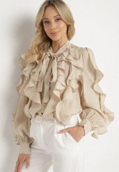 Beżowa Koszula z Wiskozą o Luźnym Kroju z Falbanami i Wiązaniem Ravionel. Brązowe koszule Born2be, m, bez wzorów, z wiskozy, eleganckie, bez kołnierzyka, bez ramiączek. W wyprzedaży za 161.49 zł.