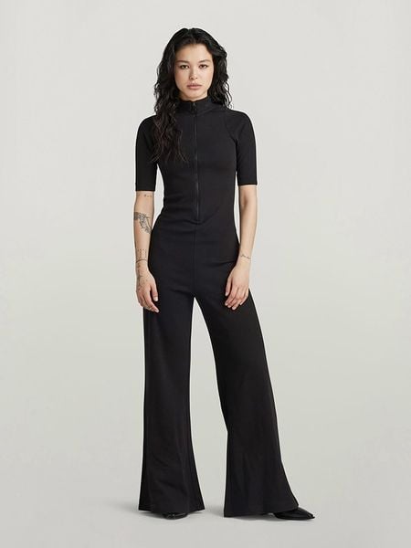 G-Star Kombinezon w kolorze czarnym rozmiar: L. Czarne kombinezony G-Star, l, bez wzorów, z bawełny, retro, bez kołnierzyka, bez ramiączek. Za 235.50 zł.