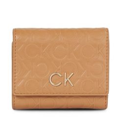 Portfel Calvin Klein. Brązowe portfele Calvin Klein, bez wzorów. Za 379.99 zł.