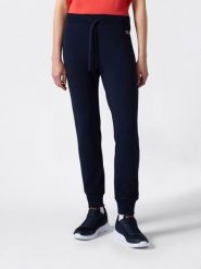 Champion Spodnie dresowe w kolorze granatowym rozmiar: XL. Niebieskie spodnie dresowe Champion, bez wzorów, z bawełny. Za 100.75 zł.