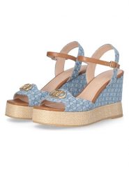 Liu Jo Sandały w kolorze błękitnym na koturnie rozmiar: 37. Niebieskie sandały Liu Jo, bez wzorów, z materiału, z otwartym noskiem, bez obcasa, na koturnie, bez zapięcia. Za 305.92 zł.