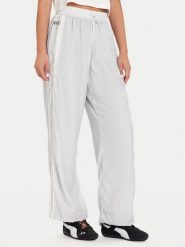 Puma Spodnie dresowe PUMA X ROSÉ T7 633796 32 Srebrny Relaxed Fit. Szare spodnie dresowe Puma, bez wzorów, z dresówki. Za 479.99 zł.