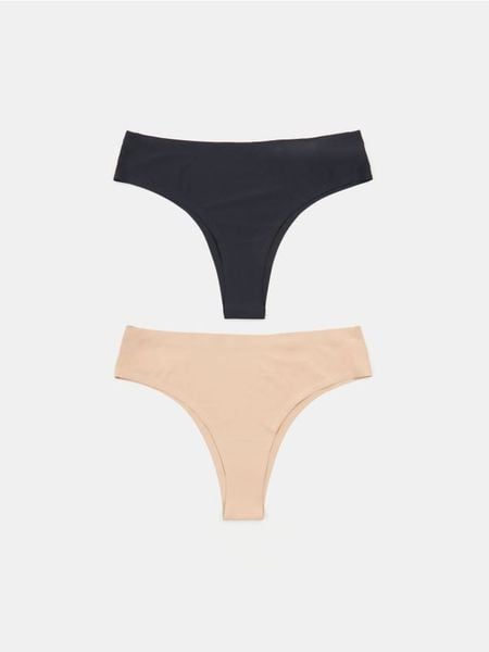 Majtki stringi 2 pack - kremowy. Białe stringi Sinsay, bez wzorów. Za 12.99 zł.