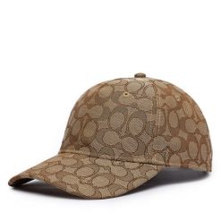 Czapka z daszkiem Coach. Brązowe czapki z daszkiem Coach, bez wzorów. Za 319.99 zł.
