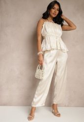 Jasnobeżowe Eleganckie Spodnie o Szerokim Kroju z Satynowym Połyskiem Lionea. Brązowe jeansy Renee, bez wzorów, z jeansu, eleganckie. W wyprzedaży za 56.99 zł.