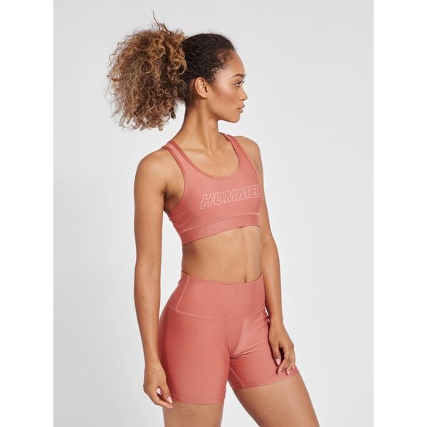 Damski biustonosz sportowy Hummel TE Tola. Fioletowe biustonosze sportowe Hummel, bez wzorów, z materiału, na fitness i siłownię. Za 129.00 zł.