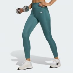 Legginsy 7/8 bez szwu z przodu Optime Essentials. Niebieskie legginsy adidas, bez wzorów, sportowe. Za 219.00 zł.