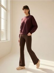 Bawełniane legginsy flare w prążek - brązowy. Brązowe legginsy Sinsay, bez wzorów, z bawełny, sportowe. Za 35.99 zł.