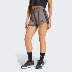 Szorty treningowe Pacer Workout Woven High Rise. Brązowe szorty sportowe adidas, bez wzorów, na fitness i siłownię, climacool (adidas). Za 149.00 zł.