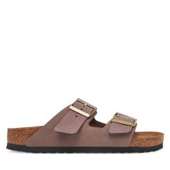 Klapki Birkenstock. Fioletowe klapki Birkenstock, bez wzorów, bez obcasa, bez zapięcia. Za 539.99 zł.