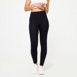 Legginsy fitness damskie Domyos. Czarne legginsy NYAMBA, bez wzorów, z bawełny, sportowe. Za 99.99 zł.