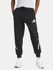 Adidas Spodnie dresowe Z.N.E. JC9309 Czarny Regular Fit. Czarne spodnie dresowe adidas, bez wzorów, z dresówki. Za 249.99 zł.
