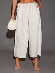 LA Angels Spodnie w kolorze kremowym rozmiar: S. Brązowe spodnie materiałowe LA Angels, bez wzorów, z materiału. Za 126.99 zł.