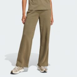 Spodnie Essentials Small Logo Feel Cozy Open-Hem. Białe spodnie dresowe adidas, bez wzorów, z polaru, długie. Za 199.00 zł.