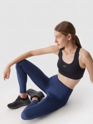 4F Legginsy treningowe z materiału z recyklingu damskie - granatowe XS. Niebieskie legginsy 4f, bez wzorów, z dzianiny, sportowe. W wyprzedaży za 69.99 zł.