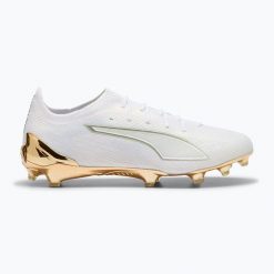 Buty piłkarskie PUMA Ultra 6 Ultimate FG puma white/metallic gold/puma black. Białe buty treningowe Puma, bez wzorów, z materiału, bez zapięcia, do biegania. Za 689.99 zł.