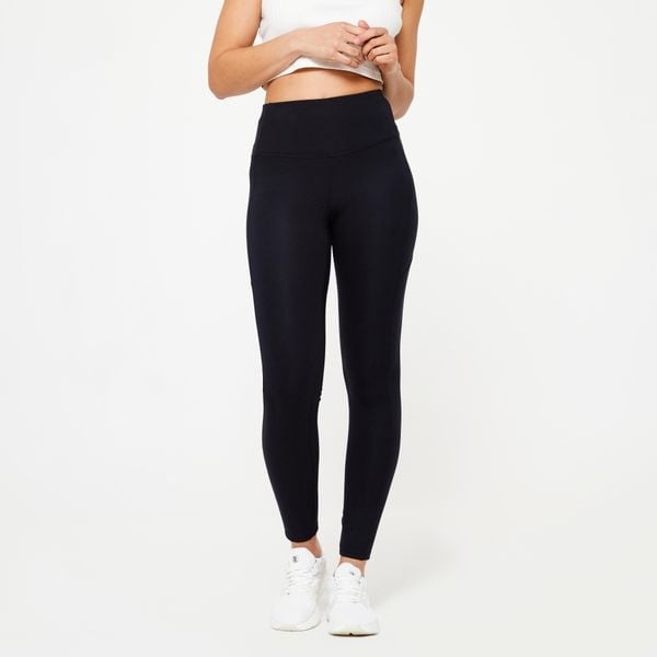 Legginsy fitness damskie Domyos. Czarne legginsy NYAMBA, bez wzorów, z bawełny, sportowe. Za 99.99 zł.