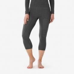 Legginsy termoaktywne narciarskie damskie Quechua BL 900 tech 3/4. Czarne bielizna termoaktywna damska WED'ZE, bez wzorów, z elastanu, bez ramiączek, narciarskie. Za 129.99 zł.