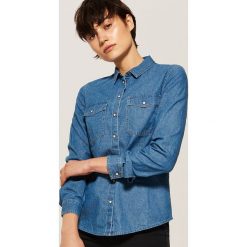 Denimowa koszula - Niebieski. Koszule marki QUECHUA. W wyprzedaży za 39.99 zł.