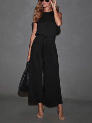 Milan Kiss Kombinezon w kolorze czarnym rozmiar: XL. Czarne kombinezony Milan Kiss, xl, bez wzorów, bez kołnierzyka, bez ramiączek. Za 200.13 zł.