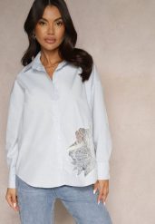Niebieska Koszula z Bawełny Ozdobiona Ażurową Wstawką Donivessa. Niebieskie koszule Renee, l, w ażurowe wzory, z bawełny, eleganckie, bez kołnierzyka, bez ramiączek. W wyprzedaży za 63.99 zł.