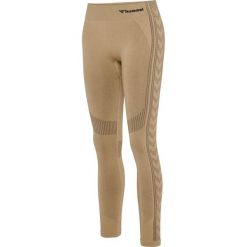 Damskie legginsy mid-rise Hummel Shaping. Brązowe legginsy Hummel, bez wzorów, z materiału, sportowe. Za 174.00 zł.