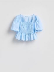 Bluzka z bufiastymi rękawami - jasnoniebieski. Niebieskie bluzki Reserved, l, bez wzorów, z bawełny, bez kołnierzyka, bez ramiączek. Za 99.99 zł.