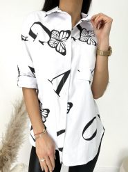 Biała Koszula Oversize w Czarny Wzór 9399-252-A. Białe koszule ModnaKiecka.pl, l, bez wzorów, z bawełny, z asymetrycznym kołnierzem, bez ramiączek. Za 104.99 zł.