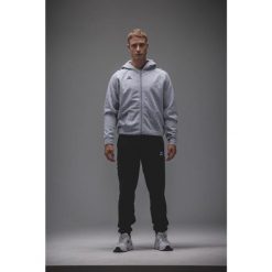 Kurtka z kapturem Erima Cmpt Wings Szara Junior. Czarne kurtki Erima, bez wzorów, z materiału, sportowe, z kapturem. Za 329.99 zł.