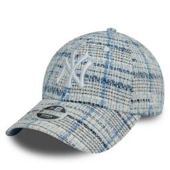 Czapka z daszkiem New Era. Niebieskie czapki z daszkiem New Era, bez wzorów. Za 99.99 zł.