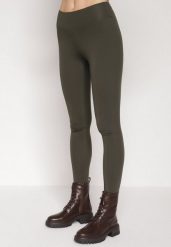 Ciemnozielone Klasyczne Legginsy z Regularnym Stanem Ralindia. Zielone legginsy Born2be, bez wzorów, z jeansu, klasyczne, długie. Za 39.99 zł.