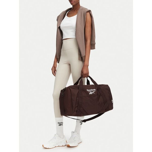 Torba sportowa Reebok. Brązowe torby sportowe Reebok, bez wzorów. Za 129.99 zł.