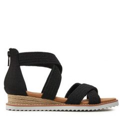 Sandały Skechers. Czarne sandały Skechers, bez wzorów, bez obcasa, na płaskiej podeszwie, bez zapięcia. Za 359.99 zł.