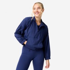 Bluza sportowa damska Domyos. Niebieskie bluzy bez kaptura DOMYOS, s, bez wzorów, z elastanu, bez kaptura, na fitness i siłownię. Za 159.99 zł.