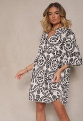 Biało-Czarna Sukienka z Bawełny o Rozkloszowanym Kroju Ozdobiona Guzikami Janivra. Czarne sukienki Renee, m, bez wzorów, z bawełny, eleganckie, bez kołnierzyka, bez ramiączek, mini, kopertowe. W wyprzedaży za 43.99 zł.