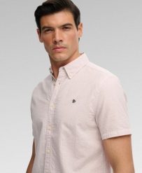 Superdry Klasyczna koszula seersucker z krótkim rękawem — 100% bawełna. Białe koszule Superdry, l, bez wzorów, z bawełny, klasyczne, bez kołnierzyka, bez ramiączek. Za 282.85 zł.