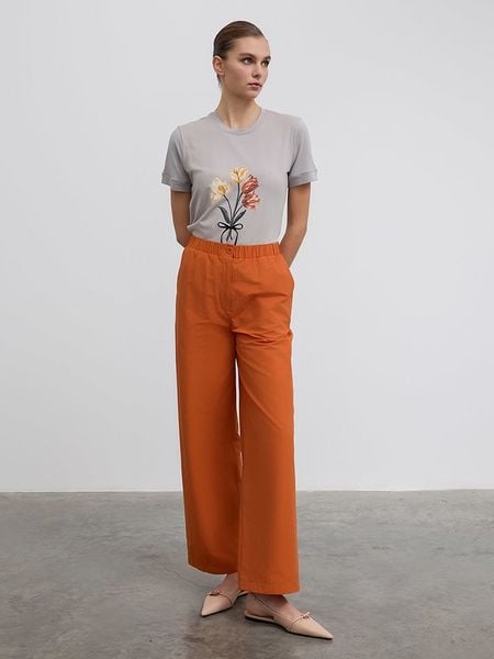 BGN Spodnie w kolorze pomarańczowym rozmiar: 40. Pomarańczowe spodnie materiałowe BGN, bez wzorów, z materiału, z podwyższonym stanem. Za 109.52 zł.