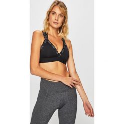 Nike - Biustonosz sportowy. Czarne biustonosze sportowe Nike, bez wzorów, z elastanu, dri-fit (nike). Za 139.90 zł.