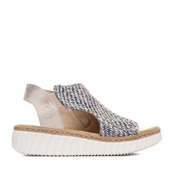 Sandały Rieker. Niebieskie sandały Rieker, bez wzorów, bez obcasa, na koturnie, bez zapięcia. Za 329.99 zł.