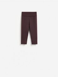 Legginsy capri - ciemnofioletowy. Fioletowe legginsy Reserved, bez wzorów, z dzianiny. Za 69.99 zł.