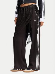 Adidas Spodnie dresowe 2In1 Firebird Loose Track Trousers With Lace Skirt LG4275 Brązowy Relaxed Fit. Brązowe spodnie dresowe adidas, bez wzorów, z bawełny. Za 369.99 zł.