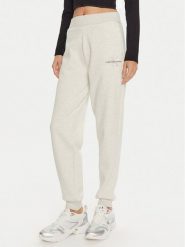 Calvin Klein Jeans Spodnie dresowe Monologo J20J223590 Szary Relaxed Fit. Szare spodnie dresowe Calvin Klein Jeans, bez wzorów, z dresówki. Za 219.99 zł.