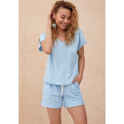 Bluzka Damska Belissa BS Błękitny. Niebieskie bluzki blue shadow, bez wzorów, z bawełny, bez kołnierzyka, bez ramiączek. Za 139.90 zł.