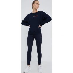 Tommy Hilfiger legginsy damskie kolor granatowy gładkie. Niebieskie legginsy Tommy Hilfiger, bez wzorów, z dzianiny. W wyprzedaży za 129.99 zł.