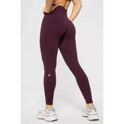 FABLETICS Damskie Legginsy Sportowe Wysoki Stan Seamless Scrunch. Czerwone legginsy sportowe FABLETICS, l, bez wzorów, z materiału, z podwyższonym stanem, na fitness i siłownię. Za 299.99 zł.