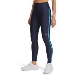 Legginsy Under armour model 6006027-403 dla kobiet. Niebieskie legginsy Under Armour, bez wzorów, z materiału. Za 280.97 zł.