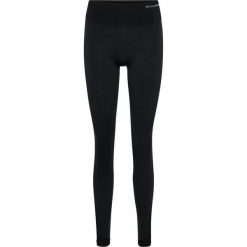 Damskie legginsy bezszwowe Hummel MT Shine. Czarne legginsy Hummel, bez wzorów, sportowe. Za 213.50 zł.