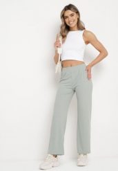 Zielone Prążkowane Spodnie Szerokie z Gumką w Pasie Drasia. Zielone jeansy Born2be, m, bez wzorów, z jeansu. Za 59.99 zł.